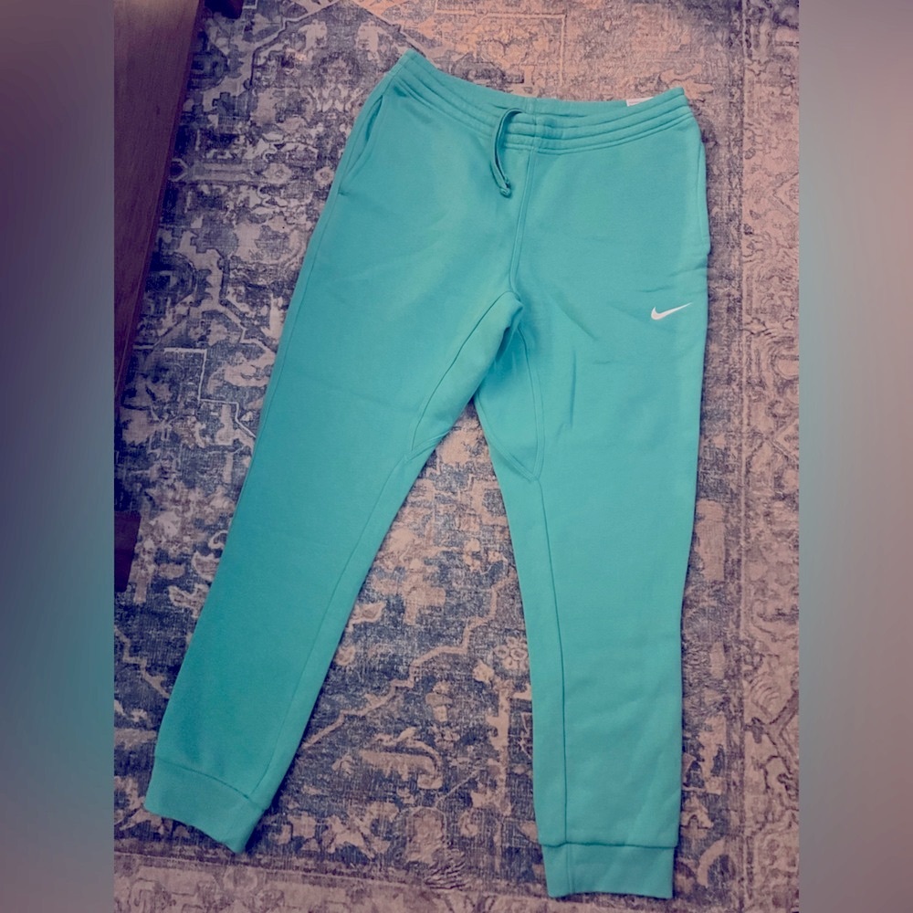 Women’s Nike teal tapered joggers